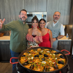 Small group enjoying seafood Paella