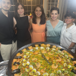 Family Gathering around Paella
